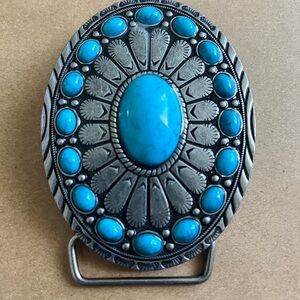 New western buckle with a large oval faux turquoise center stone